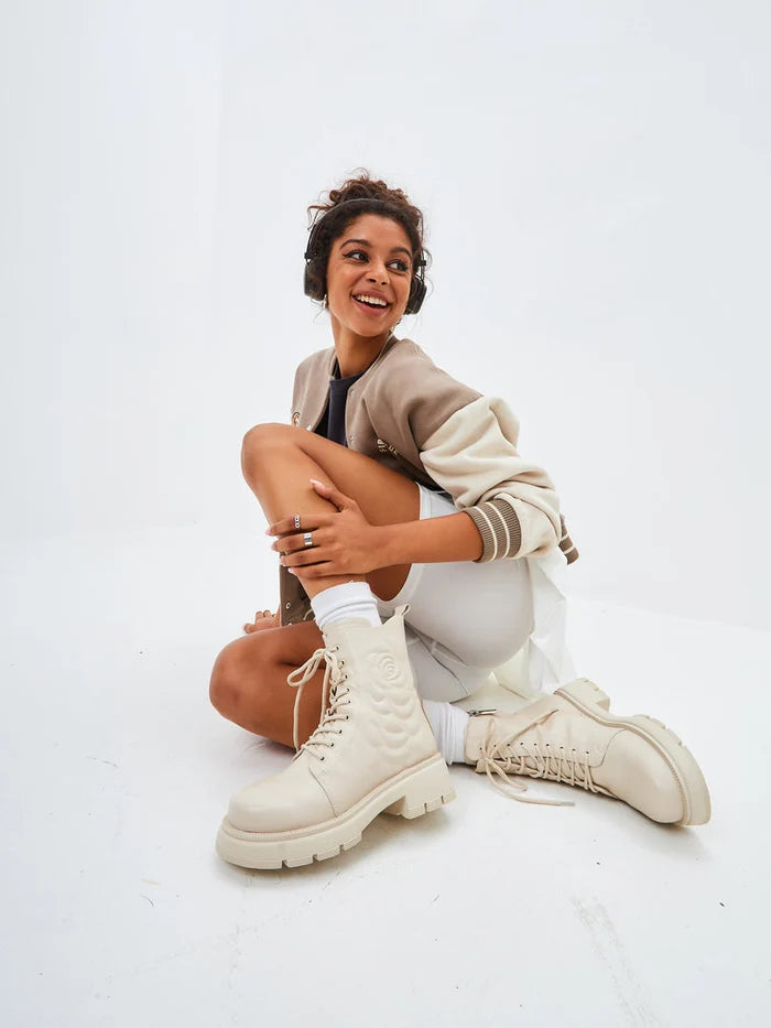 Stylish women's ivory leather platform ankle boots with high heels