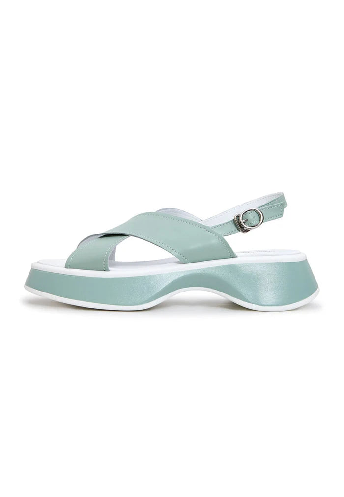 A stylish pair of green leather platform Tuti sandals for women, perfect for summer vibes.