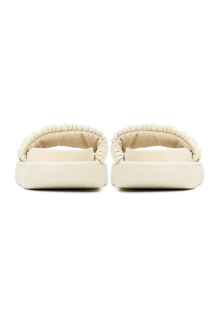 A stylish pair of beige leather Mirena sandals for women, perfect for summer fashion footwear.