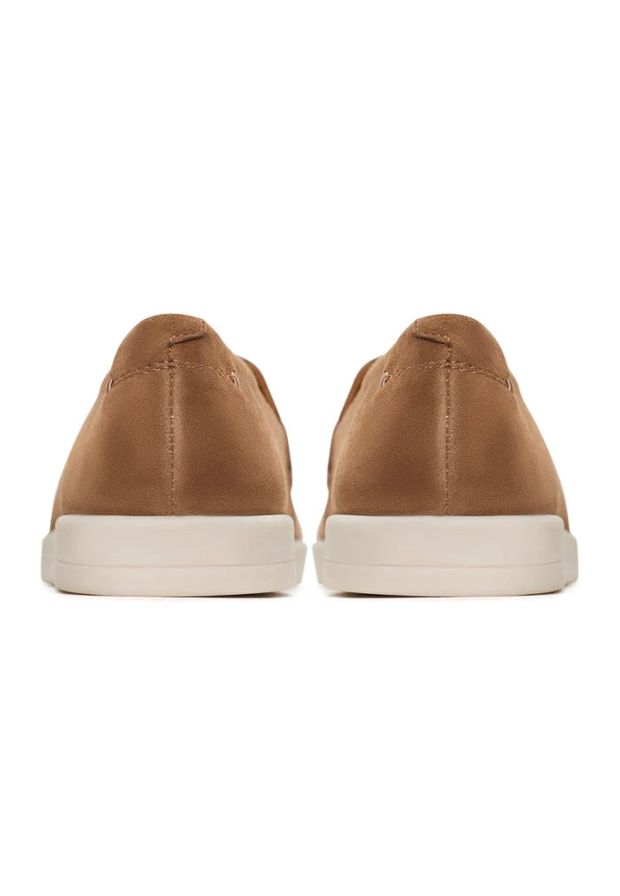 A pair of stylish beige low platform loafers - perfect casual footwear for women featuring the Alaska touch.