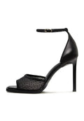 A pair of luxurious black crystal ankle-strap heels, perfect for an elegant look.