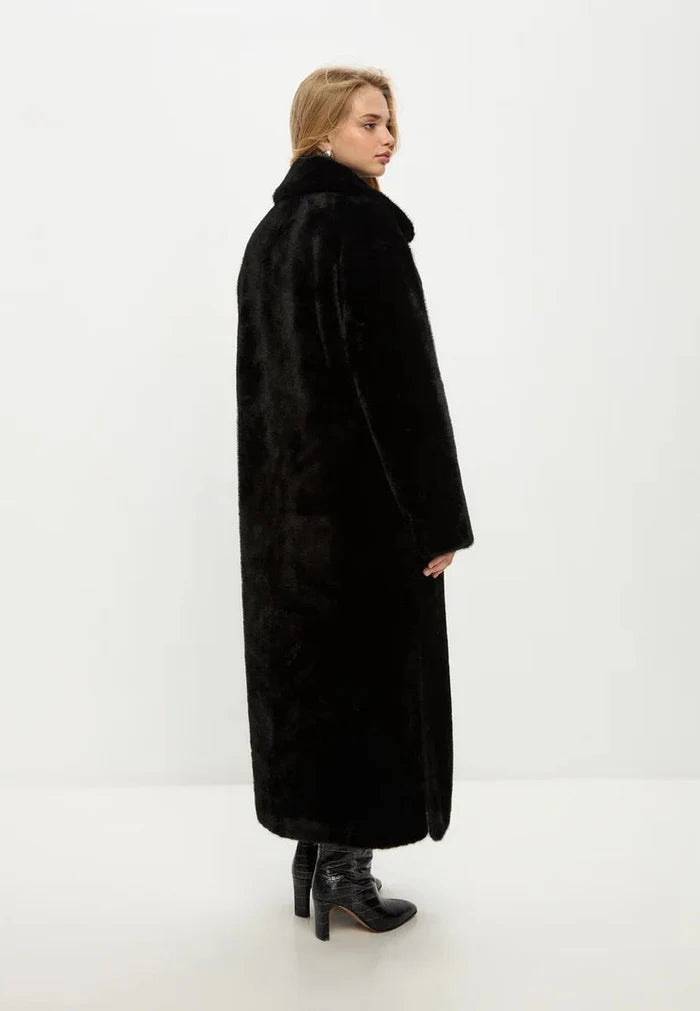 A stylish Freya faux fur coat in luxurious black, perfect for winter fashion.