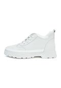 A trendy pair of chunky white sneakers featuring a cozy merino wool lining, combining style and comfort in this must-have merino wool footwear option with a chunky sole design.