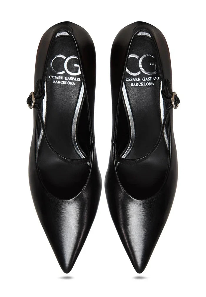 A stylish pair of Midnight Muse silver Mary Jane heels, perfect for women looking for elegant metallic silver footwear.