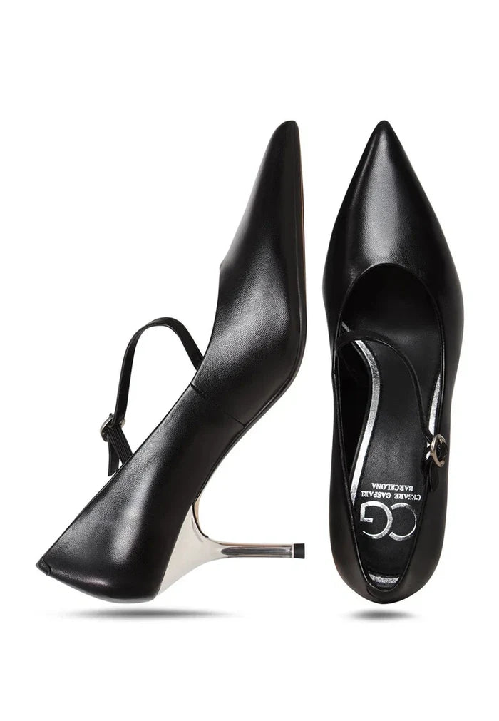 A pair of elegant Women's Silver Mary Janes with Midnight Muse shoes, featuring stylish Mary Jane heels in metallic silver, perfect for special occasions.