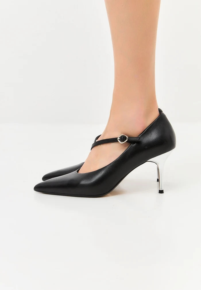 A stylish pair of Women's metallic silver Mary Jane heels, also known as Midnight Muse shoes.