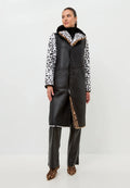 A stylish reversible faux fur Flavia coat with a chic leopard print on one side and a mixed print on the other, perfect for staying cozy and fashionable all winter long.