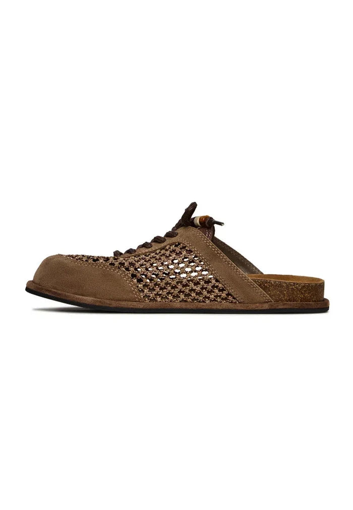 Stylish and comfortable open-back mules, perfect for on-the-go with Nomad Breeze slip-on shoes.