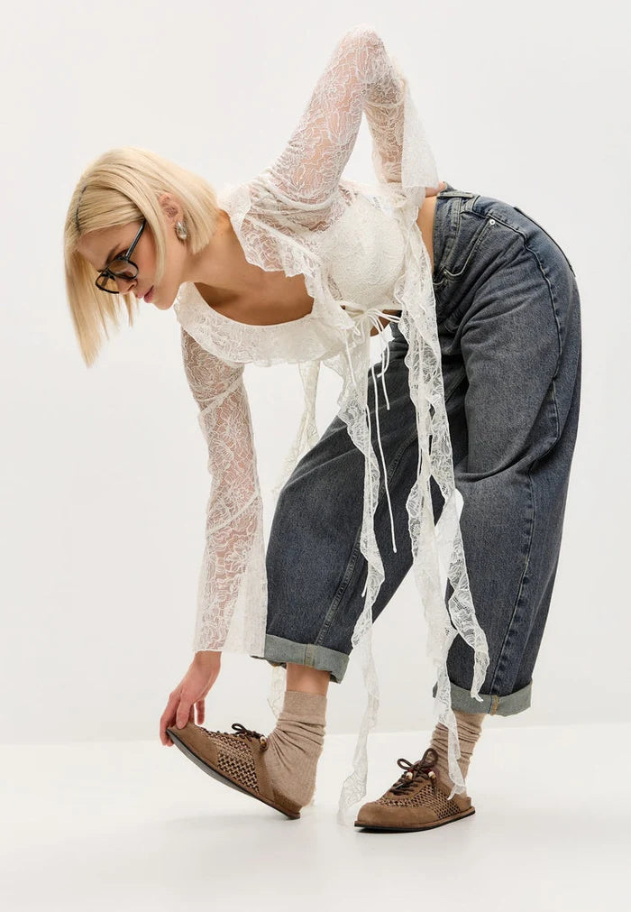 A pair of stylish and comfortable Nomad Breeze open-back mules, perfect slip-on footwear for everyday wear.