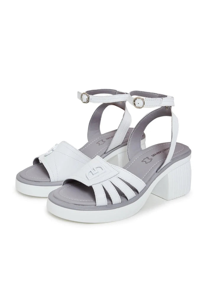 A close-up of chic women's open toe block heel sandals in a trendy neutral color.