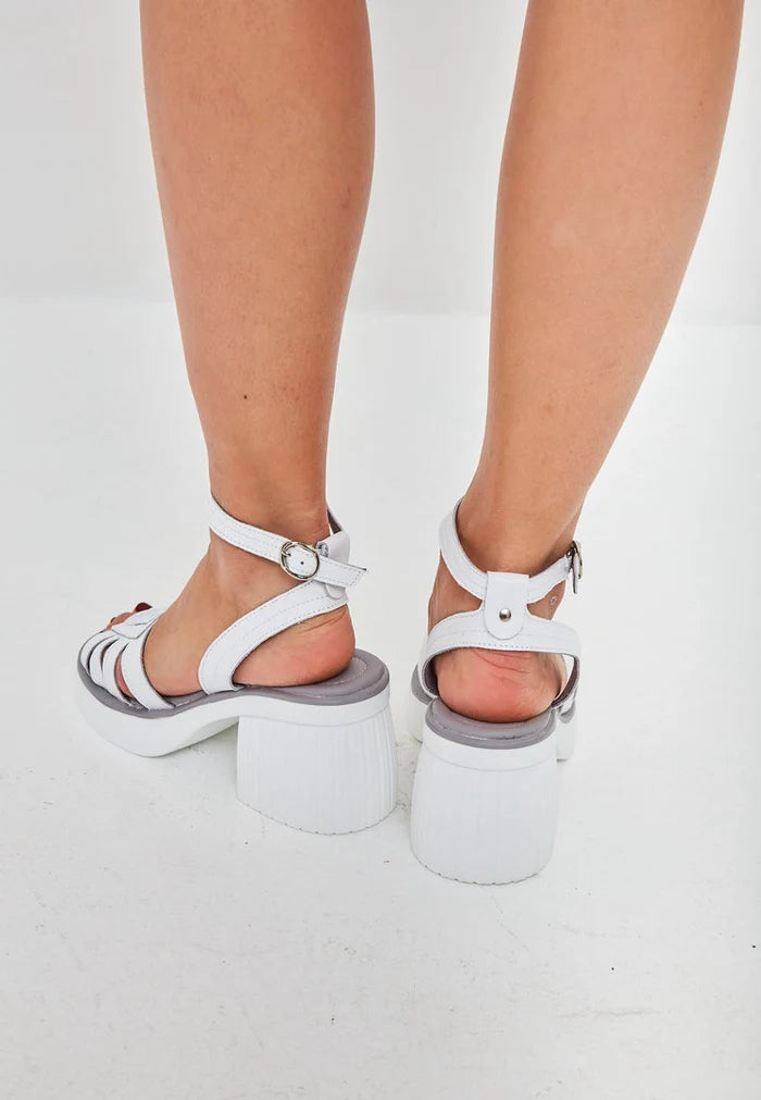 A trendy pair of open toe block heel sandals for women, perfect for any occasion.
