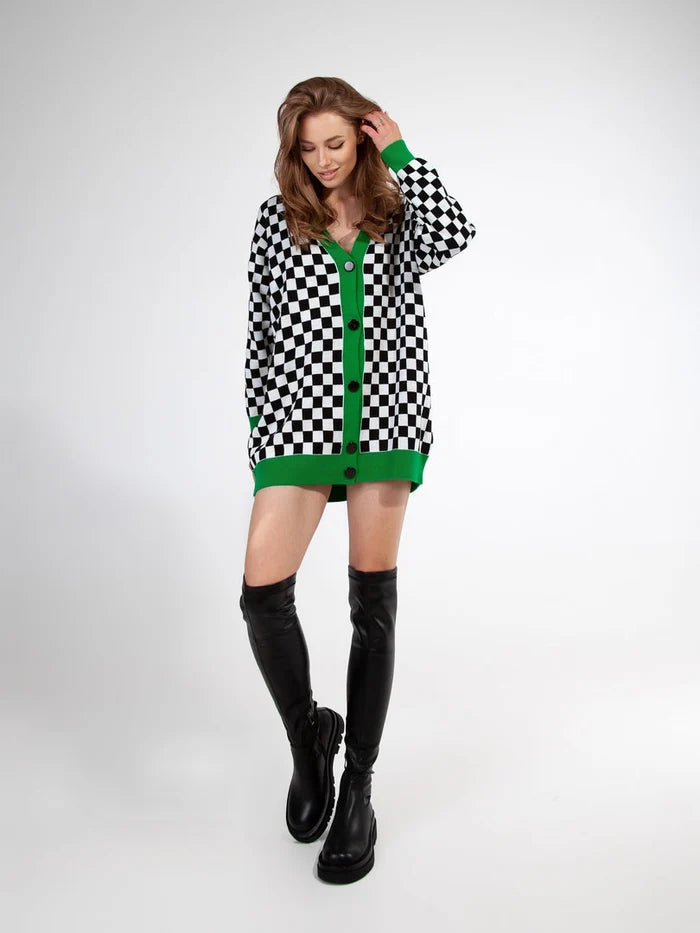 A fashionable woman wearing trendy over-the-knee chunky boots, one of the must-have fall/winter footwear trends in women's fashion.