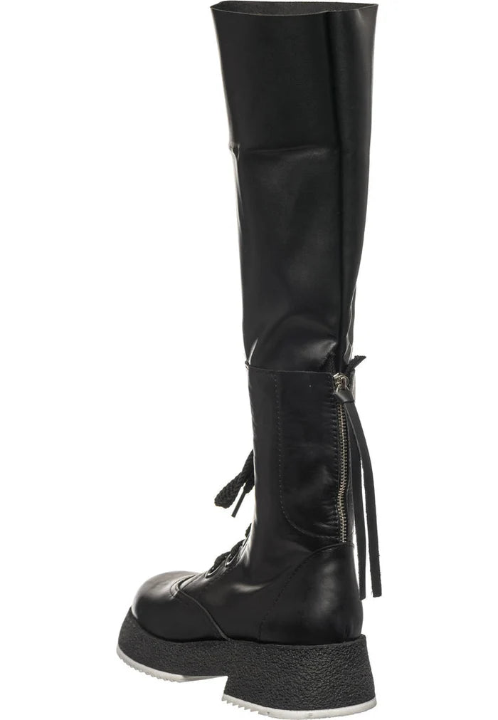 A stylish collection of women's fashion boots including over-the-knee boots, lace-up combat boots, and trendy knee-high lace-up boots.