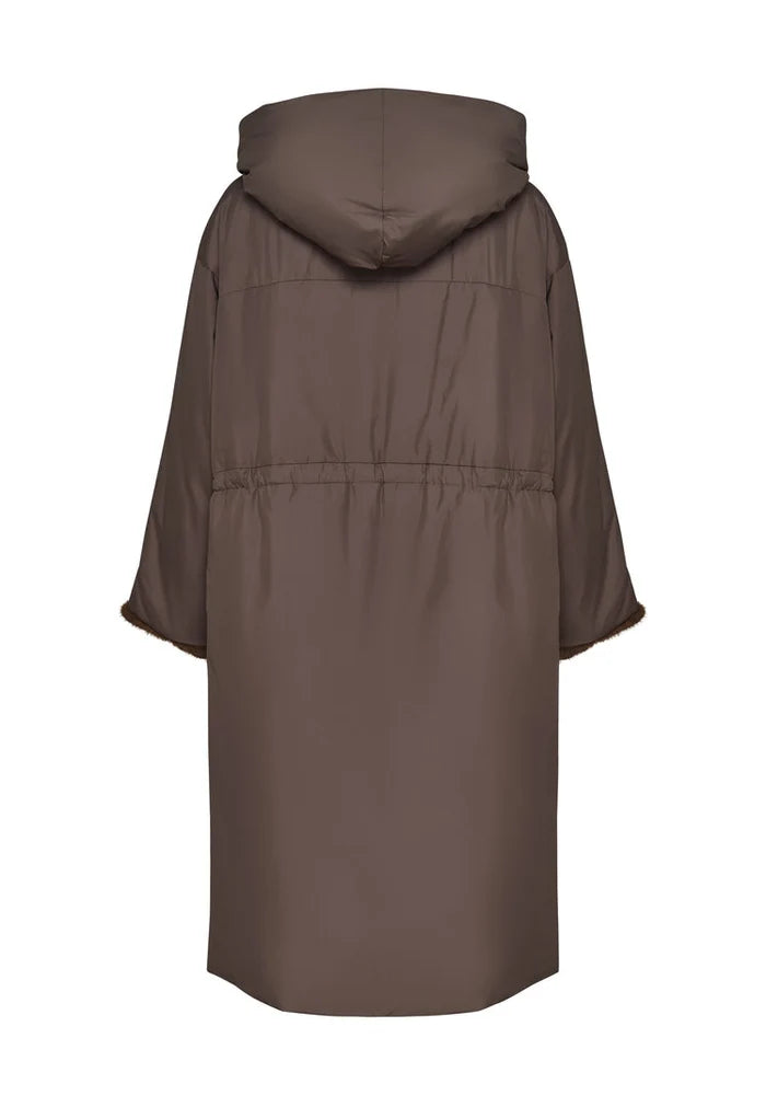 A stylish beige oversized hooded puffer coat for women with faux fur cuffs, perfect for staying warm and on-trend this winter.