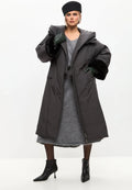 A stylish gray oversized hooded puffer coat with faux fur cuffs, perfect for plus size outerwear in women's fashion.