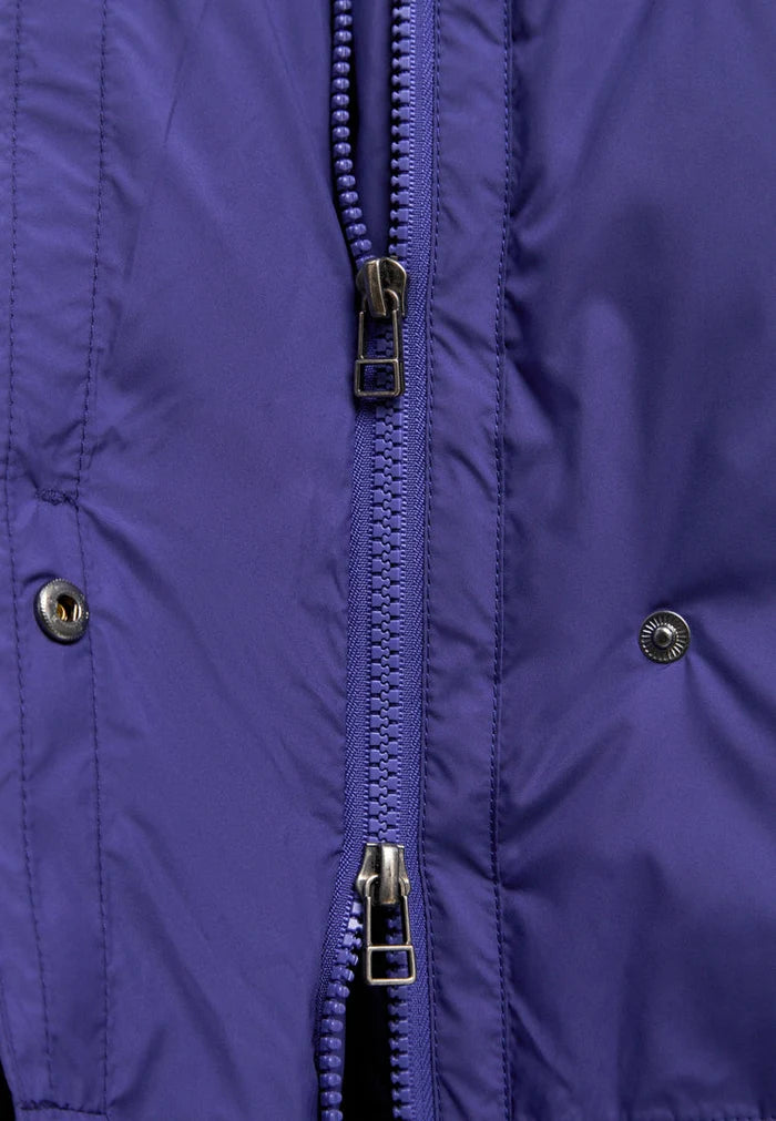 A stylish violet winter coat, women's oversized puffer jacket for plus-size, perfect for staying warm and fashionable in the colder seasons.