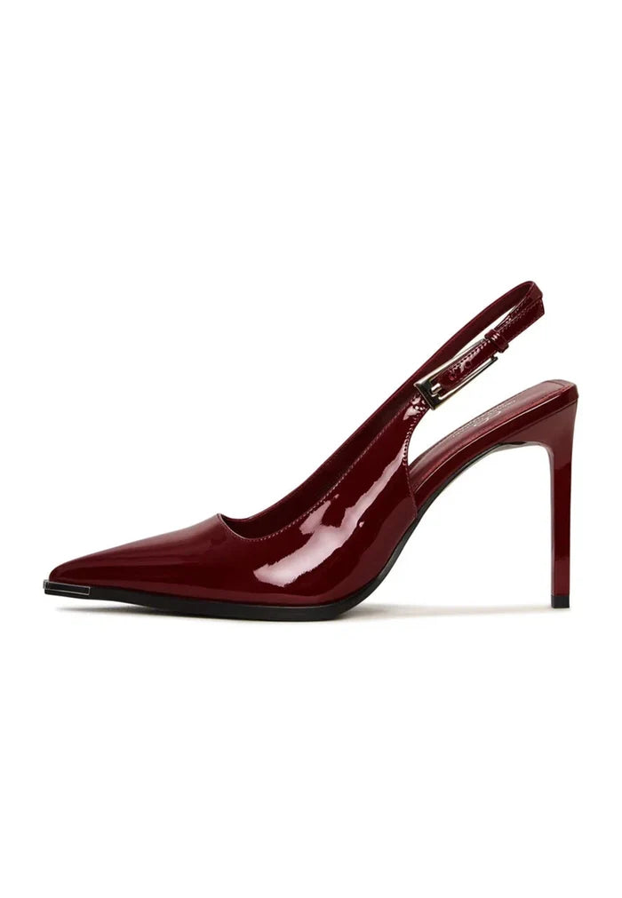 A stylish pair of red patent leather slingback pumps, perfect for any occasion.