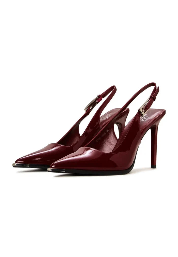 A stylish pair of women's red patent leather slingback pumps, perfect for adding a pop of color to any outfit.
