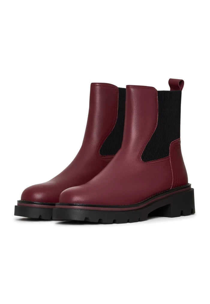 A stylish pair of classic bordeaux ankle boots, perfect for women who love fashion and designer footwear.