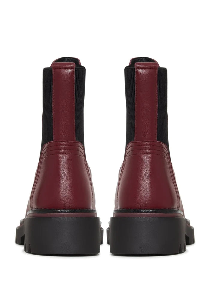 A stylish pair of classic Bordeaux ankle boots for women, perfect for adding a touch of fashion to any outfit.