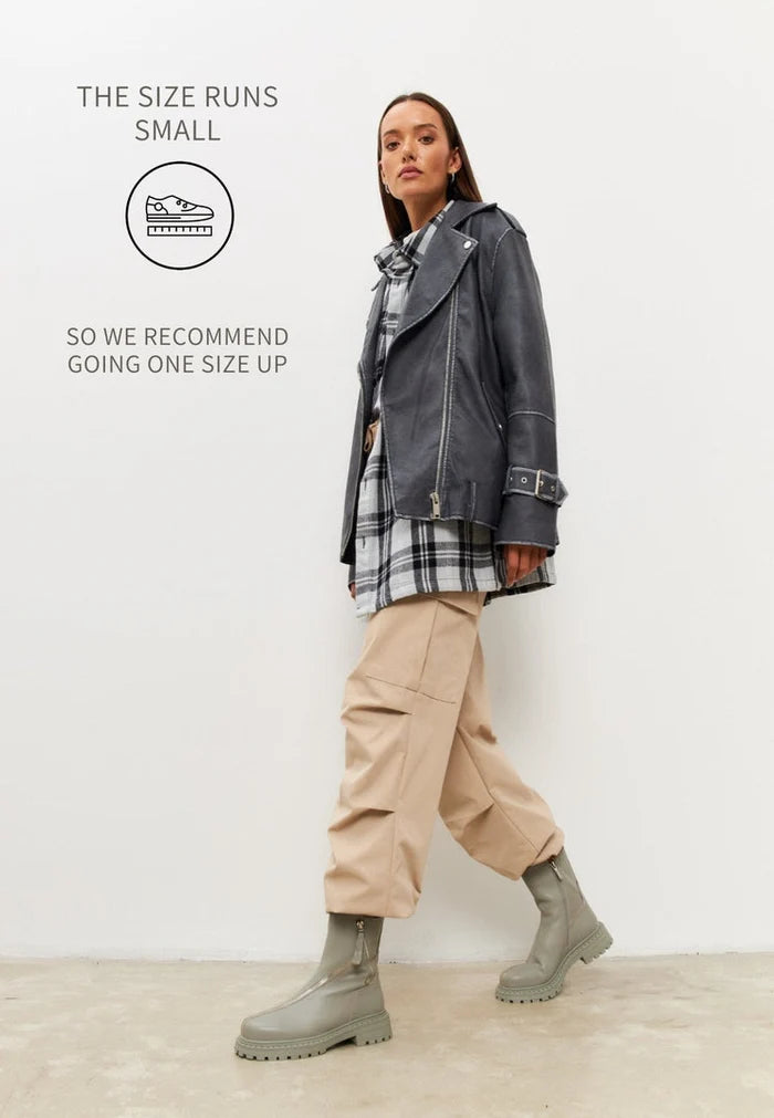 Stylish green leather platform ankle boots for women - a trendy choice in fashion footwear.