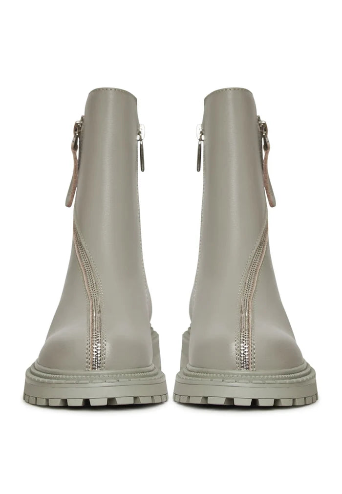 A stylish pair of green leather platform ankle boots for women, perfect for a fashion-forward look.