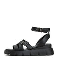 A stylish pair of platform leather sandals perfect for summer days - buy platform leather sandals online.