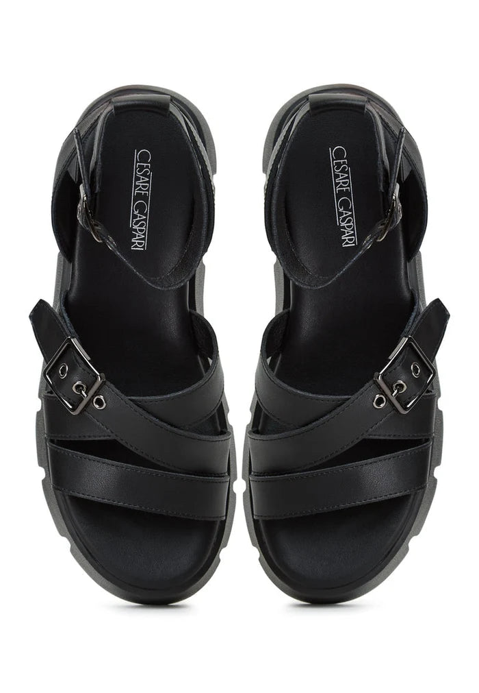 A stylish pair of platform leather sandals available for purchase online.