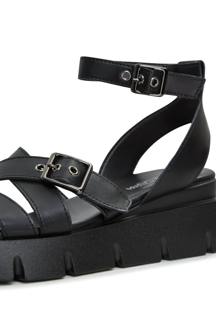 A pair of stylish platform leather sandals, perfect for summer days. Buy platform leather sandals online for the ultimate trendy look.