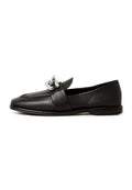 A stylish pair of Valeria black platform loafers, the perfect choice for women looking for trendy black platform shoes.
