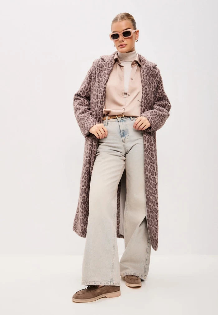 A pair of stylish dark beige Aurelia platform moccasins for women, perfect for those looking for fashionable footwear.