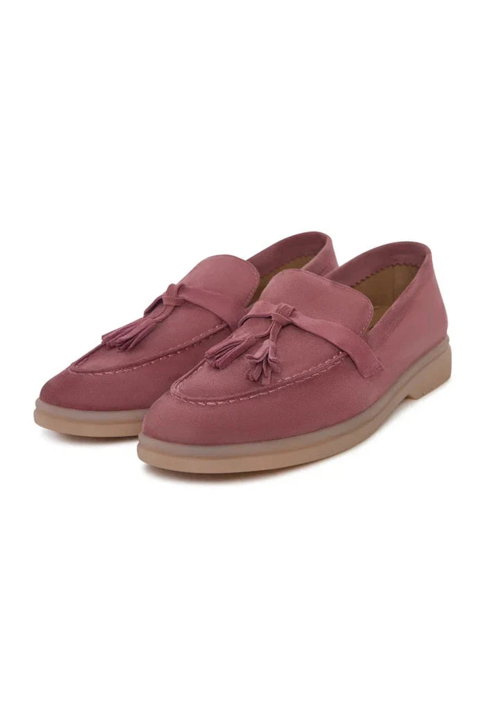 A stylish pair of pink platform moccasins by Aurelia Footwear, the ultimate fashion statement for women.