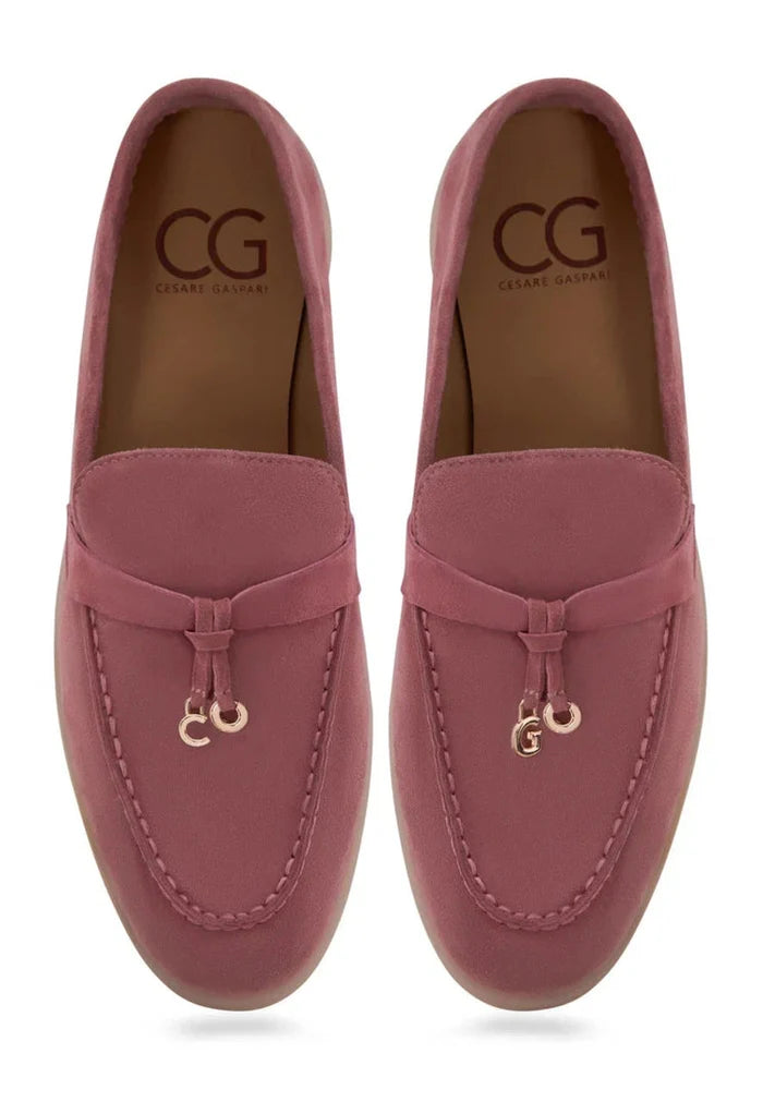 A pair of stylish pink platform moccasins by Aurelia Footwear, perfect for fashion-forward women.
