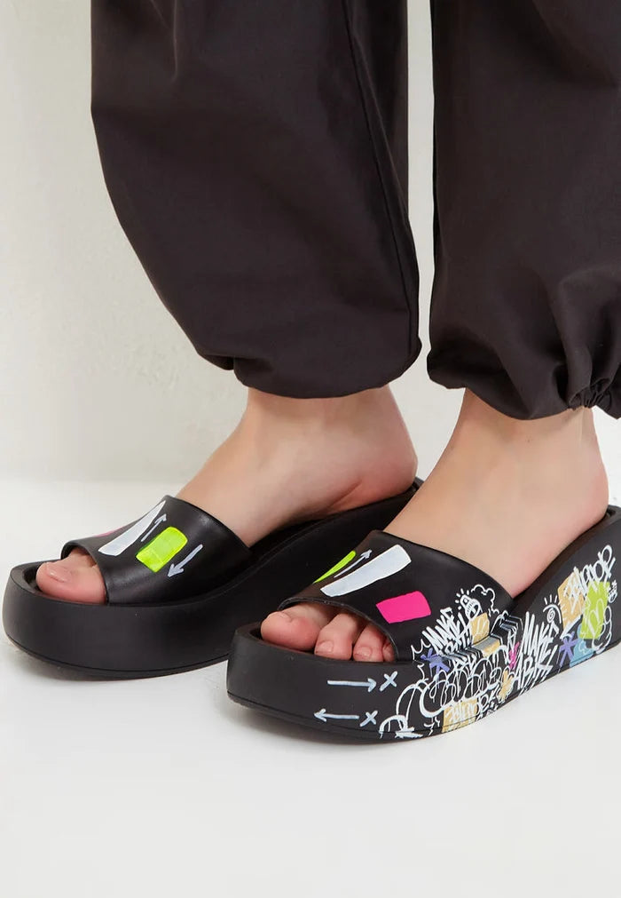 A stylish pair of black high heel mule shoes for women - a fashionable choice in women's footwear.