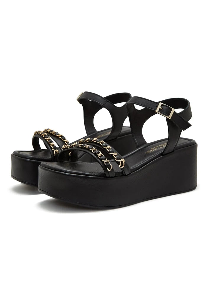 A fashionable pair of women's black platform sandals with eye-catching gold chain accents.
