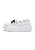 A pair of stylish slip-on platform shoes in white, perfect for women's casual footwear.