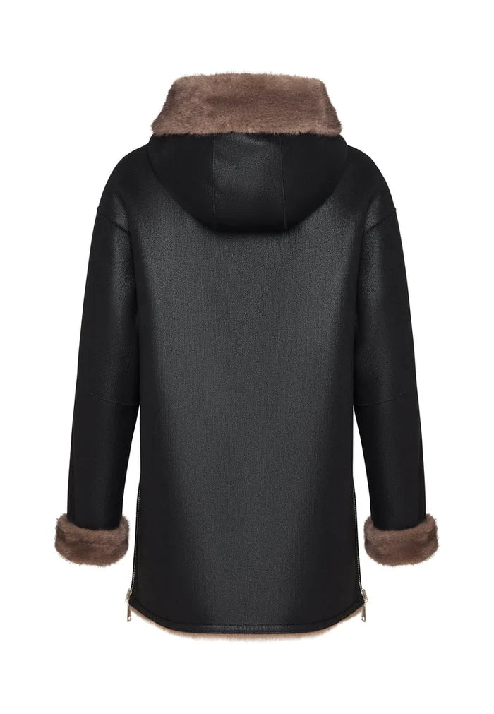 A stylish and trendy reversible faux leather jacket with faux fur trim, the perfect vegan leather outerwear with chic fur details.