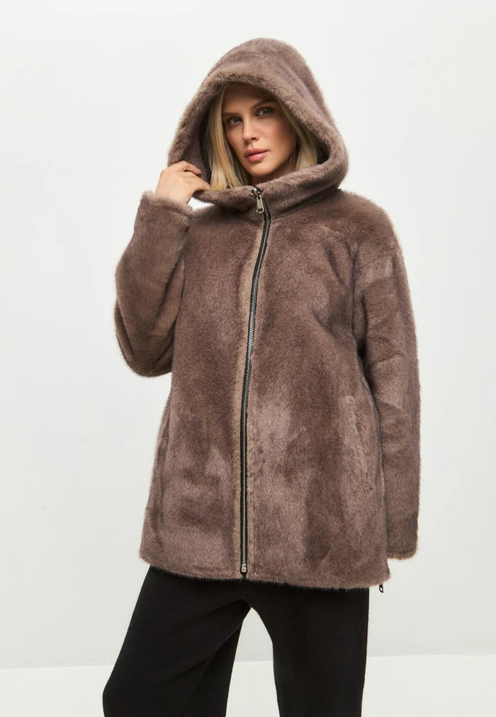 A fashionable reversible faux leather jacket with faux fur trim details, perfect for a stylish outerwear look.