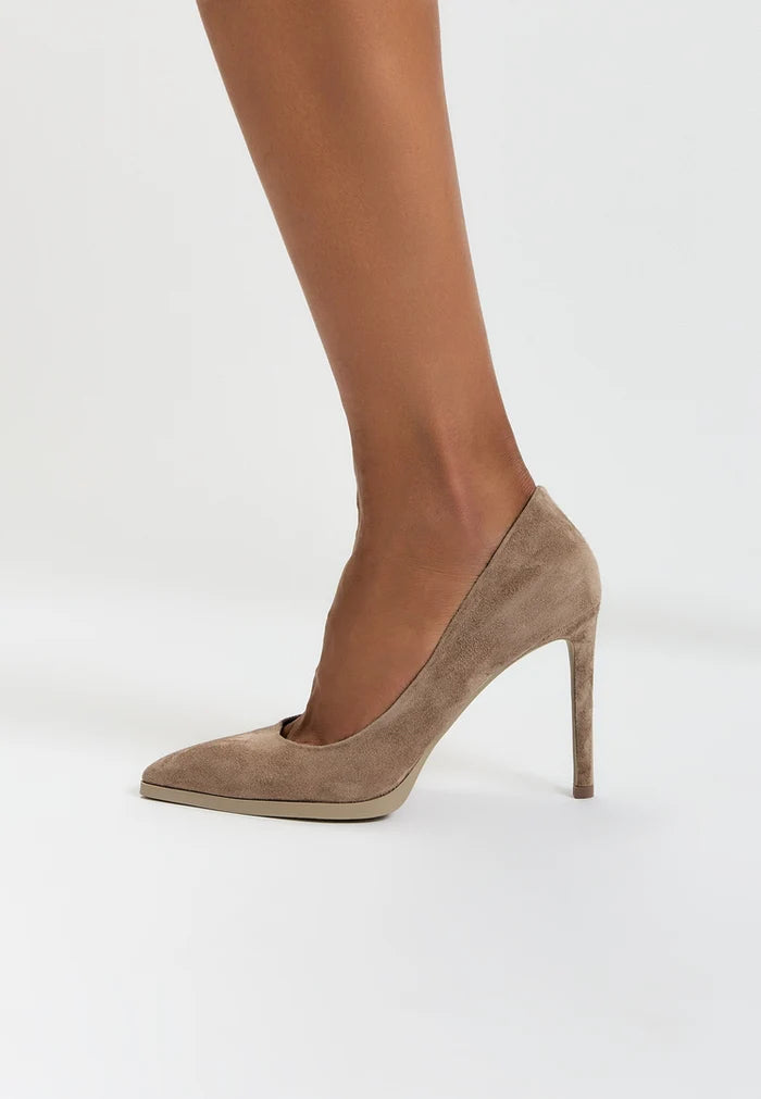 A pair of elegant beige suede stilettos with a stunning skyline design, perfect for any fashionable woman.