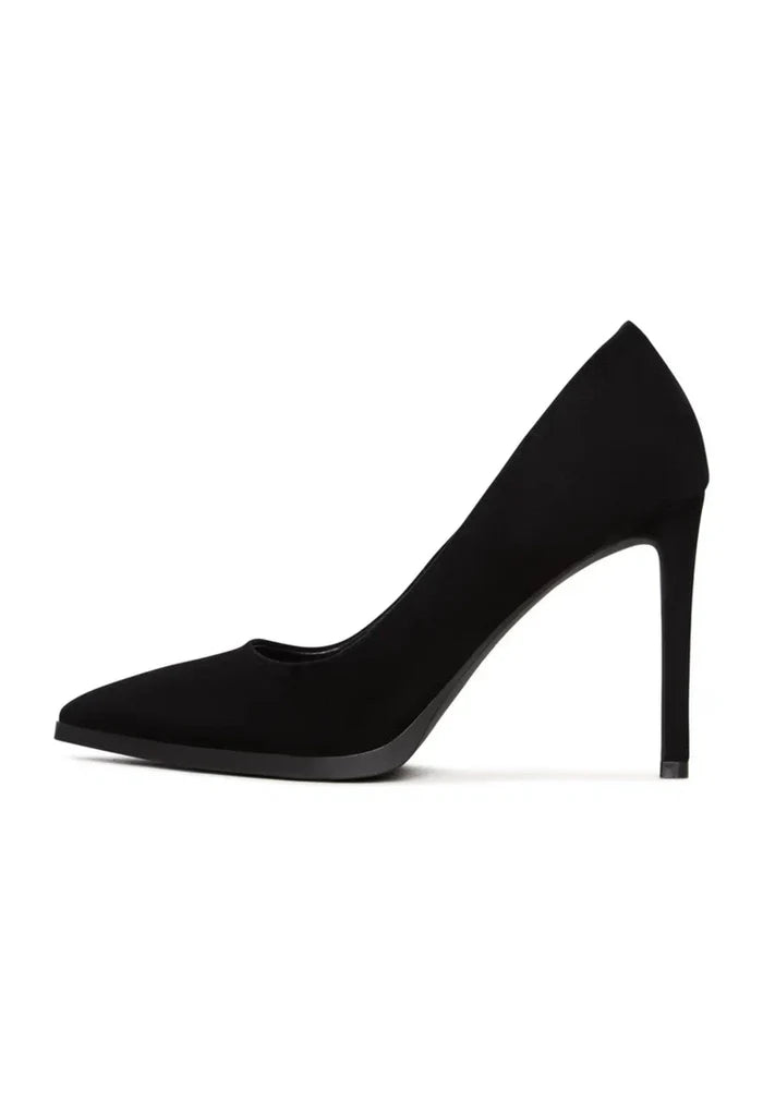 A pair of elegant black suede stilettos with a stunning skyline design, perfect suede heels for women's high fashion.