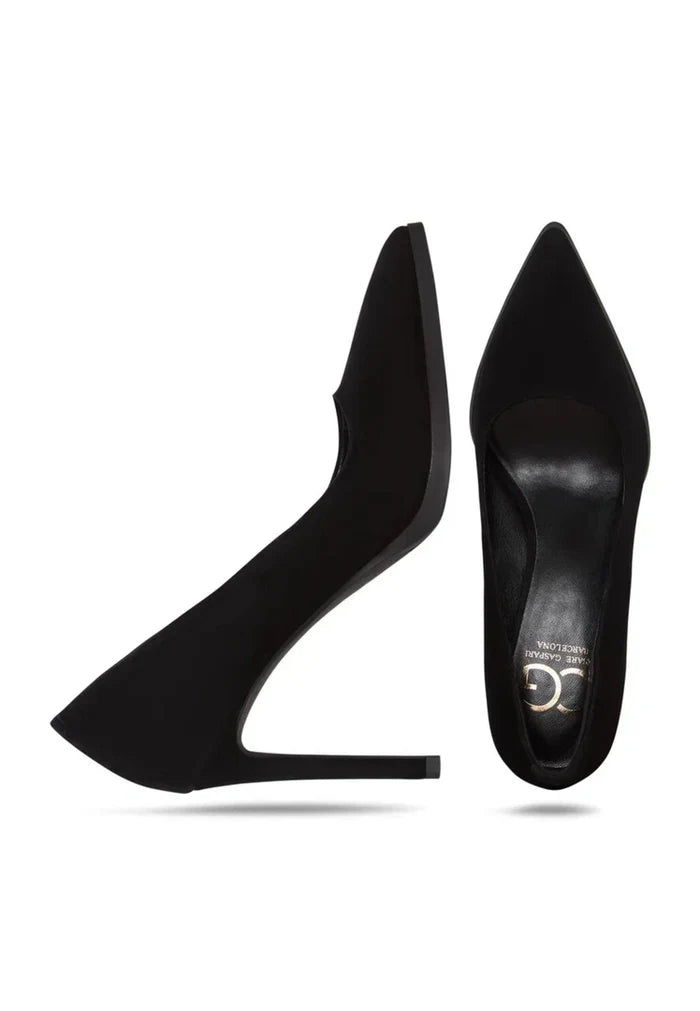 A pair of stylish black suede stilettos with a city skyline design, perfect suede heels for women's high fashion.