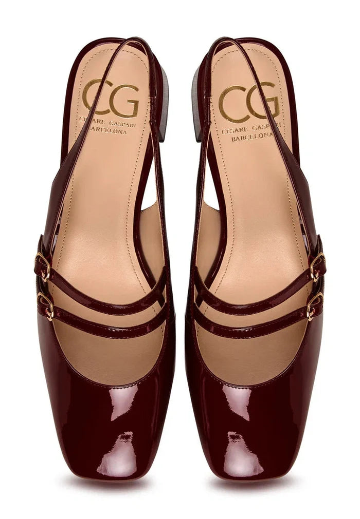 A chic pair of Bordeaux slingback block heel pumps by Mar y Sol, perfect for trendy women's shoe collections.