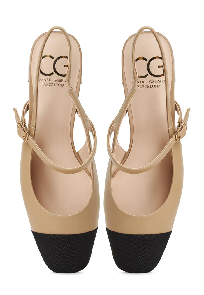 A stylish pair of Marisol beige slingback block heel pumps - the perfect combination of comfort and sophistication.