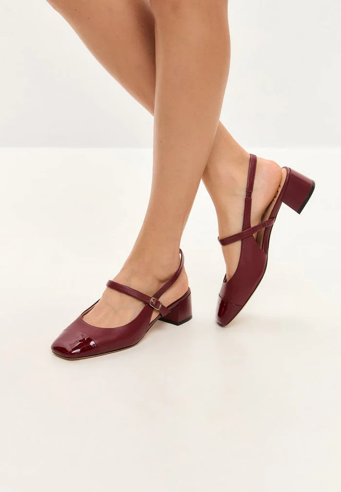 A chic and sophisticated pair of Bordeaux pumps, also known as Marisol pumps, featuring slingback block heels for women looking for elegant and stylish footwear.