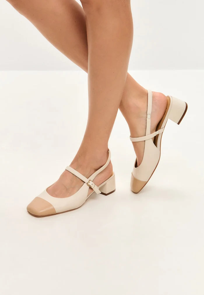 A stylish pair of Women's slingback block heel pumps in light beige, the Pumps Marisol, perfect for a fashion-forward look.