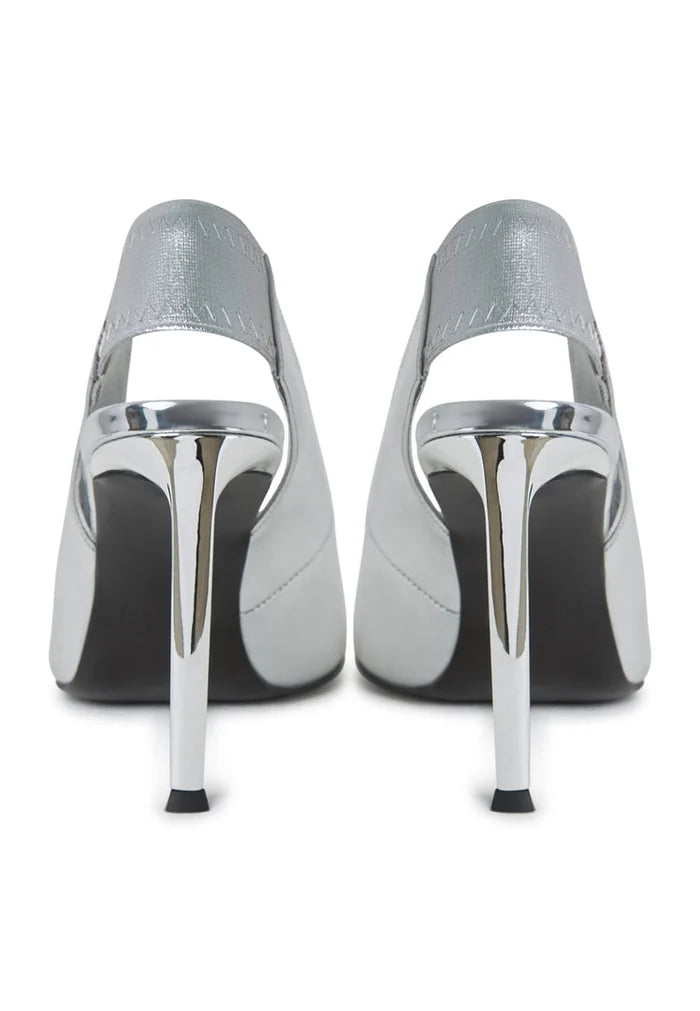 A stylish pair of women's high heel shoes featuring slingback design, high heeled pumps known as Patricia pumps, in a stunning silver color.