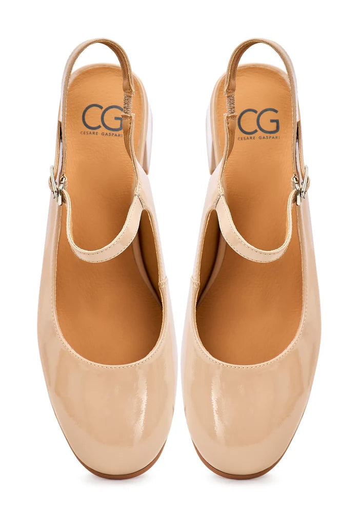 A stylish pair of beige Nina slingback pumps, ideal women's dress shoes for a fashionable look.