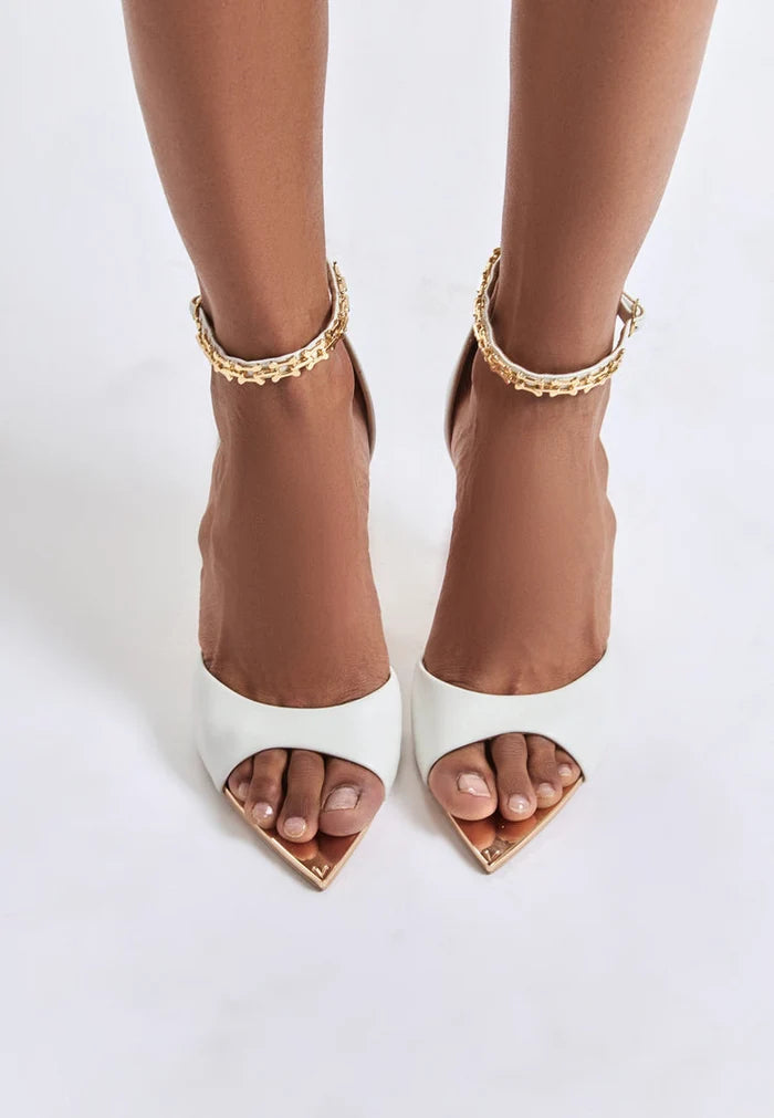 A pair of elegant white stiletto high heeled sandals, perfect for any occasion. Buy white stiletto sandals online now!