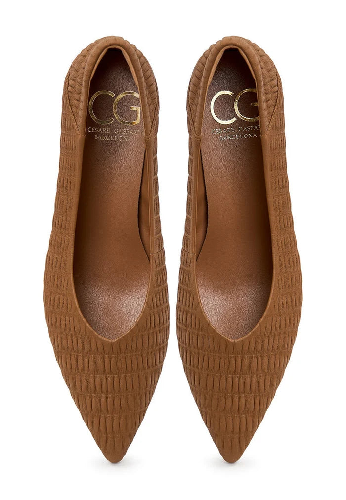 A pair of stylish brown stiletto heels, also known as pumps, named Carol, perfect for women's fashion.