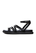A close-up image of stylish women's leather strappy sandals, perfect for summer fashion and comfortable everyday wear.